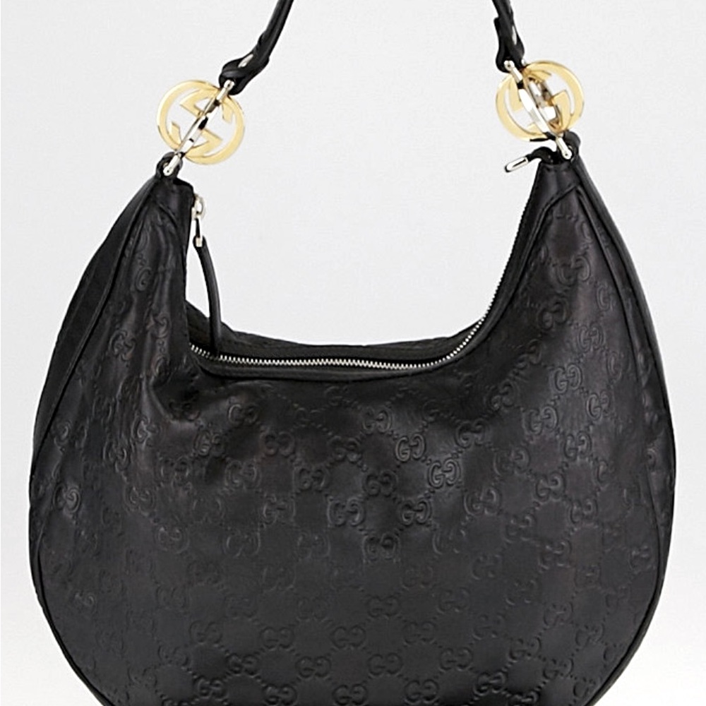 Black Gucci bag.
